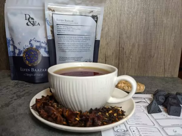Profile photo of elven bazaar tea with all its ingredients on the saucer below it